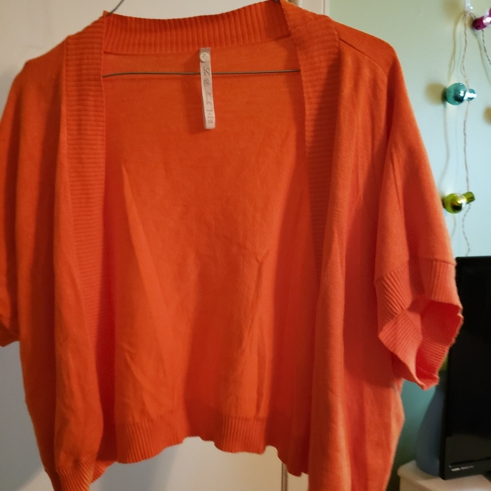Orange quarter length sweater